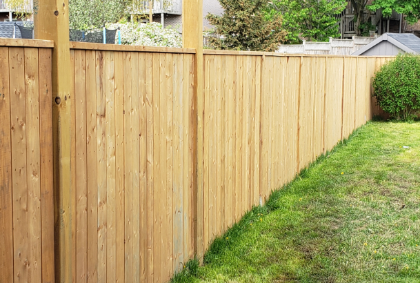 Wood Grain Vinyl Fence in Bellingham, Buzzards Bay MA